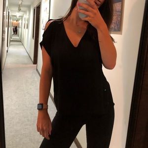 Lush cold-shoulder black top in medium